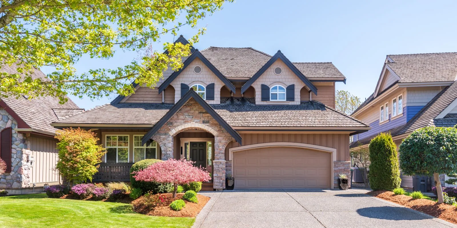 Beautiful home exterior with landscaped yard